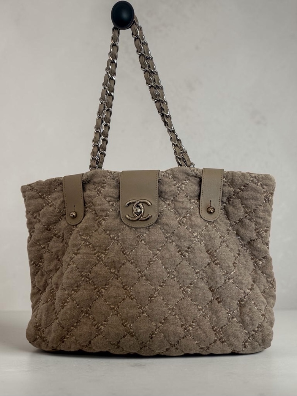 CHANEL quilted fabric tote bag with taupe leather accents. Classic Chanel chain